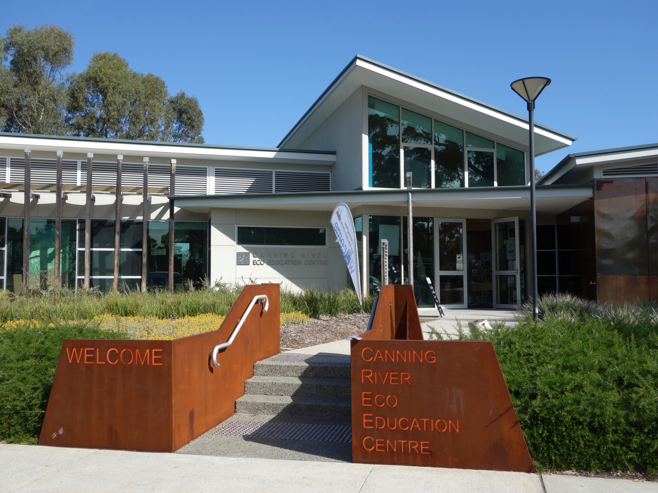 A photo of the outside of the Canning River Eco Education Centre on a sunny day.