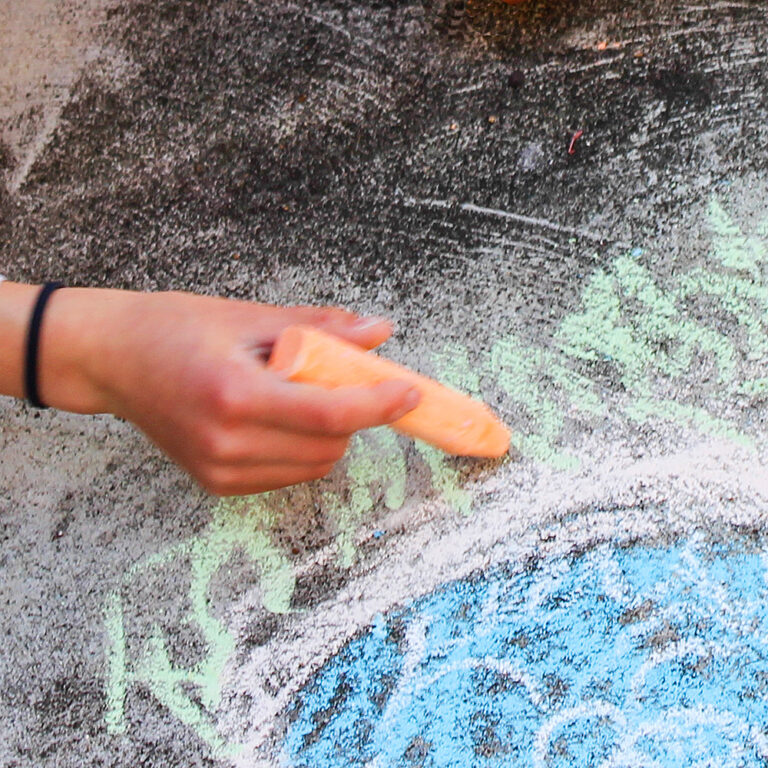 Chalk drawings on pavement