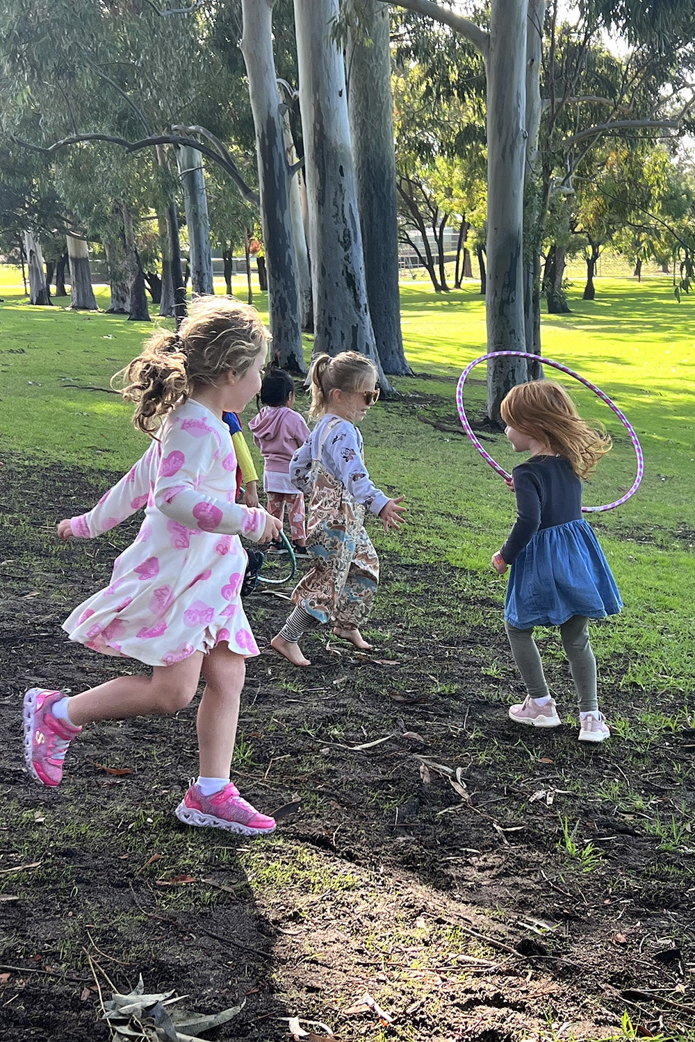 Kids playing with hula hoops