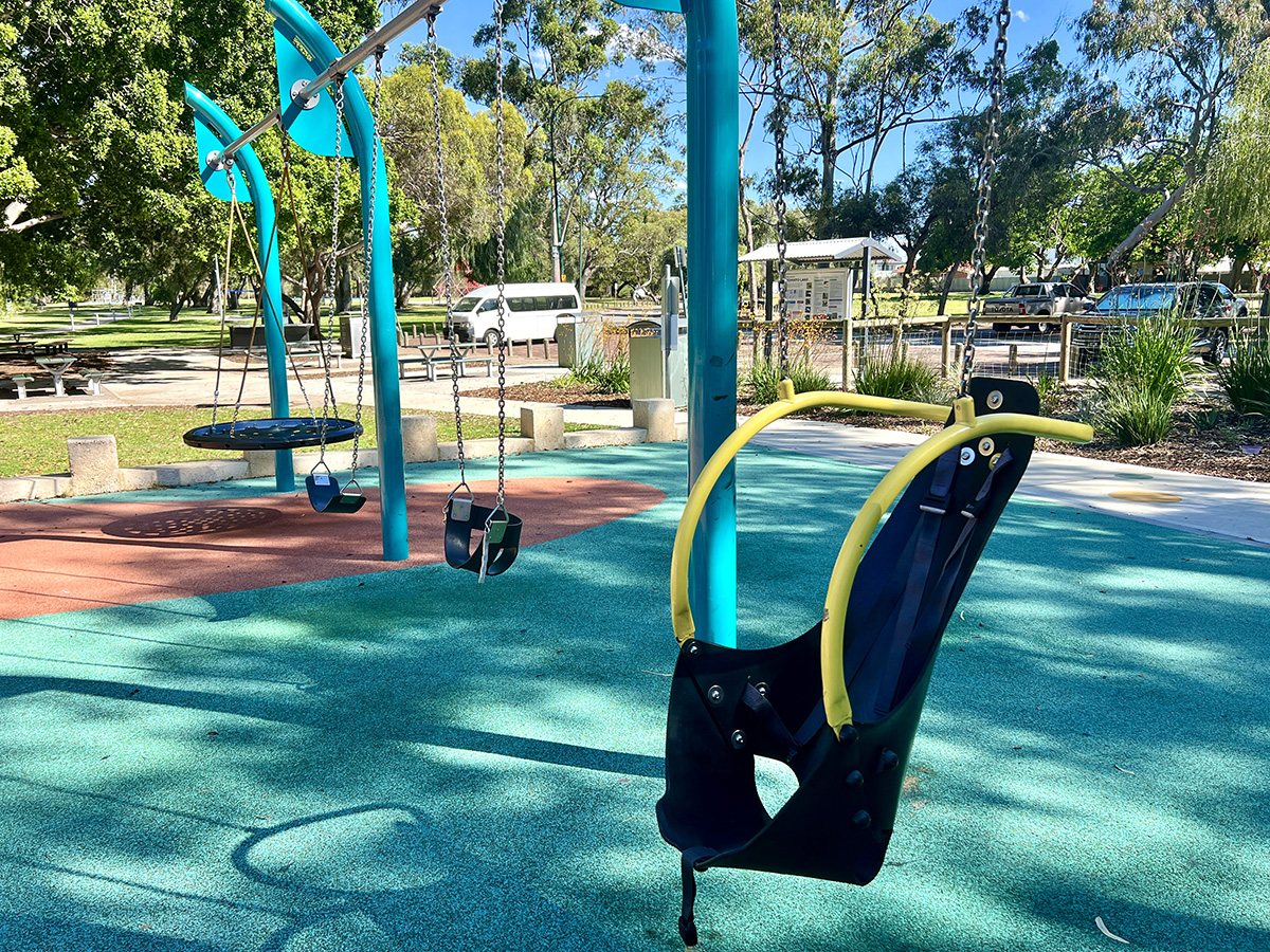 Tomato lake playground swings