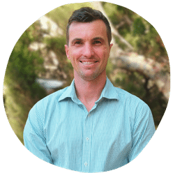 A photo of Mark Dunlop smiling at the camera.